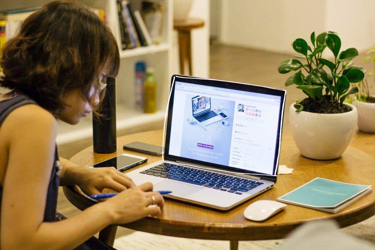 Woman researching at computer